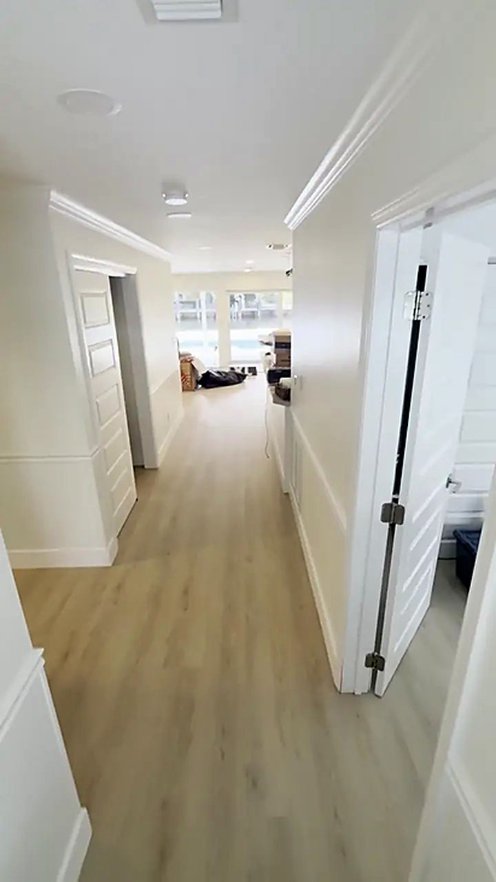 Coffe Cream vinyl plank flooring installed by Ozzifloors