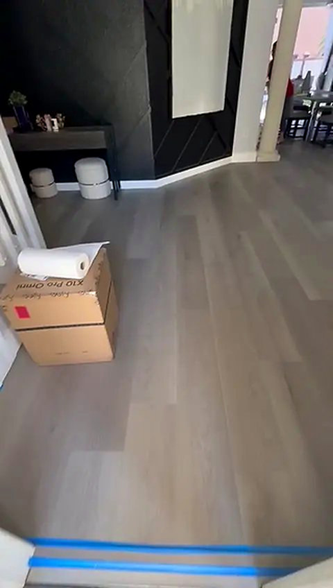 Grey Shield vinyl plank flooring installed by Ozzifloors