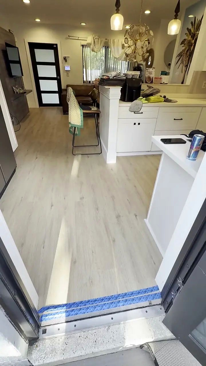 Hessonite vinyl plank flooring installed by Ozzifloors