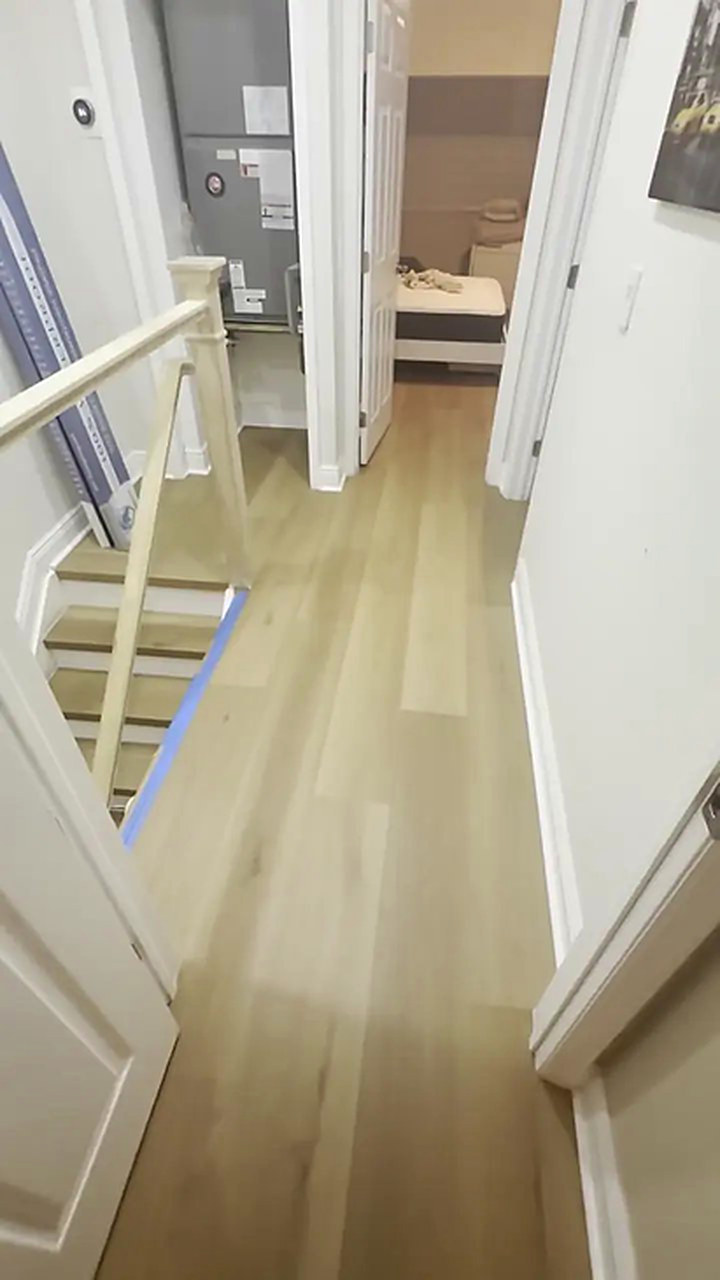 Petrified Oak vinyl plank flooring installed by Ozzifloors