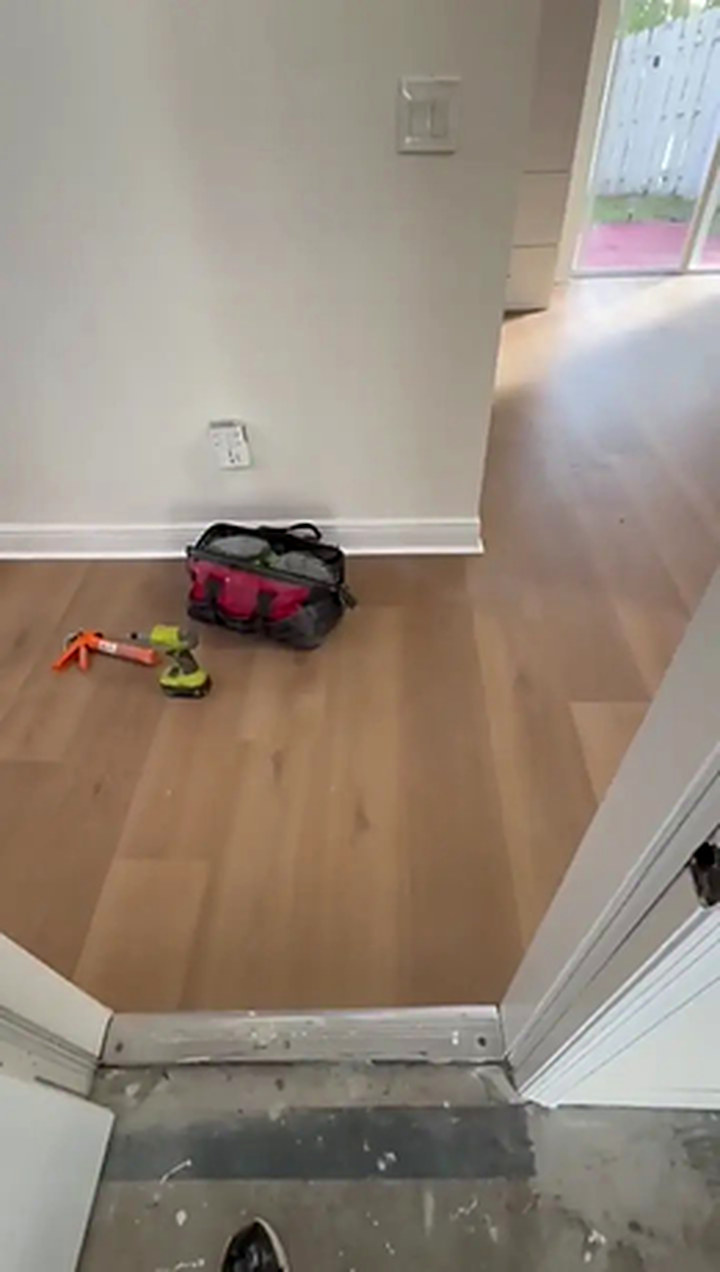 Petrified Oak vinyl plank flooring installed by Ozzifloors in Deerfield Beach