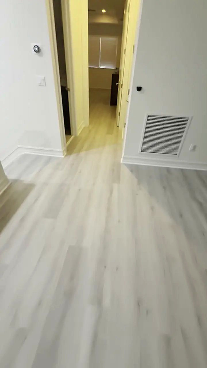 Plata Oak vinyl plank flooring installed by Ozzifloors