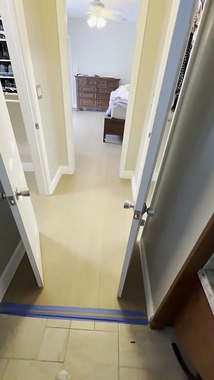 Sandy Oak laminate flooring installed by Ozzifloors